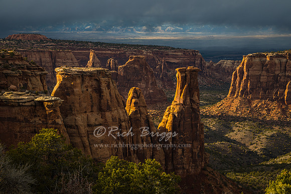 The Colorado National Monument with the Sun Poking Through the Clouds